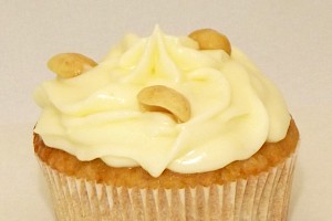 Erdnuss-Cupcake mit Frischkäse-Topping